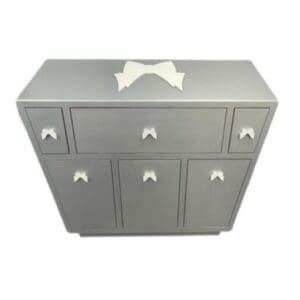 Grey dresser with white bow
